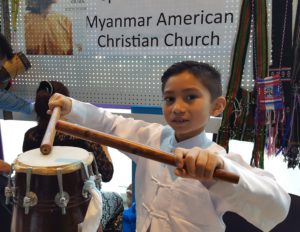 Things To Do in Kent: This charming boy from the Myanmar American Christian Church booth played the drum for me.
