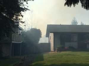 Kent News: Brushfire along I-5 north threatens West Hill homes.