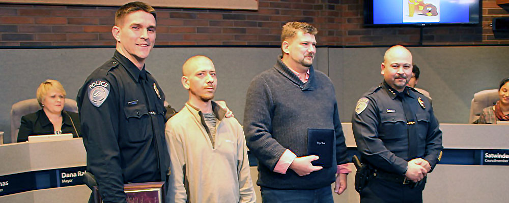 Citizen, officer honored for lifesaving efforts at council meeting