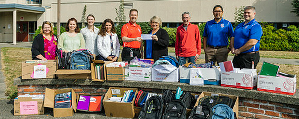 City staff collects back-to-school supplies for Kent-Meridian High School