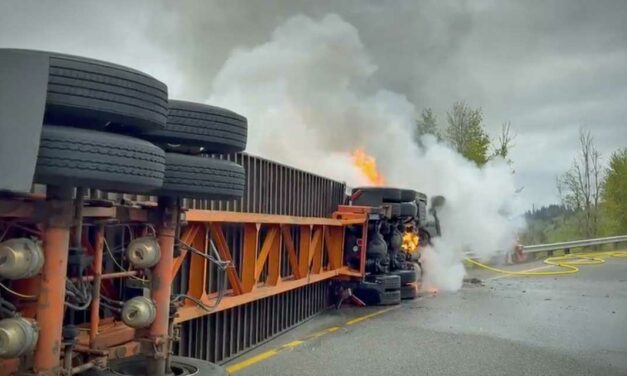 2 injured, 1 critically after semi-truck crashes, catches fire on SR 18 near SR 167